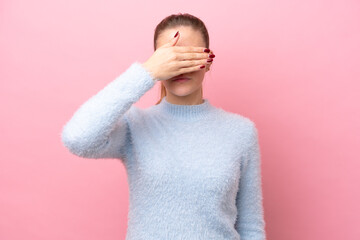 Young caucasian woman isolated on pink background covering eyes by hands. Do not want to see something