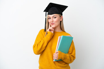 Young student caucasian woman isolated on white background thinking an idea while looking up