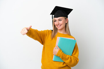 Young student caucasian woman isolated on white background giving a thumbs up gesture