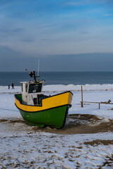 Naklejka na ściany i meble fishing boat on the beach