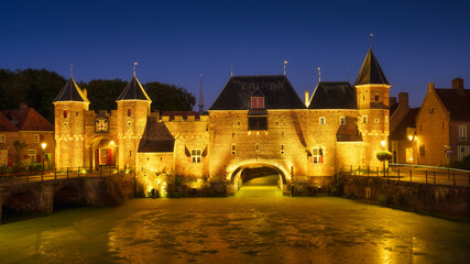 Amersfoort, Netherlands. An ancient castle and a moat of water. Historic architecture in the evening. Buildings in Holland. A place for travel and tourism. Panoramic view.