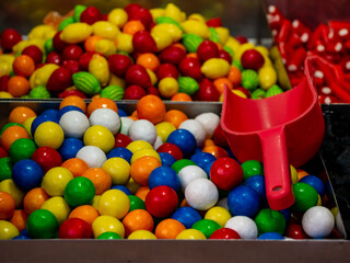 close-up shot variety of colorful candy balls of various flavor