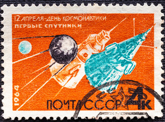 USSR - CIRCA 1964: A stamp printed in USSR Russia shows The first sputniks, Cosmonautics Day serie.