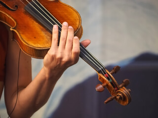 Woman plays a concert violin