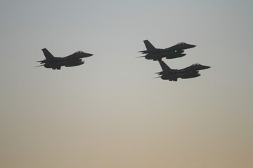 f 16 fighter jet in Turkish Air Force aerobatic demonstration team which called Turkish Stars are flying on the sky for 9 September- Izmir Independence Day