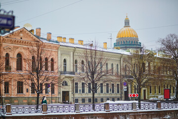 Moyka river embankment on cold snowy winter day in Saint Petersburg, Russia