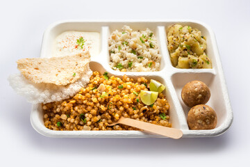 Indian Upwas thali, fasting food platter or thali for home delivery or takeaway parcel for any Vrat