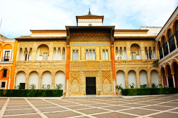 Fototapeta na wymiar Mudejar Palace or Palace of King Don Pedro in the Patio de la Montería of the Alcázar of Seville, Andalusia, Spain