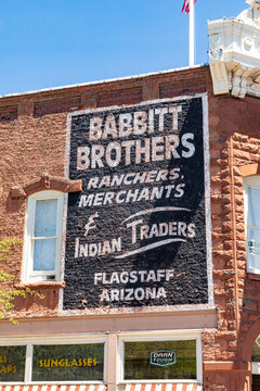 old historic brick building with advertising downtown Flagstaff