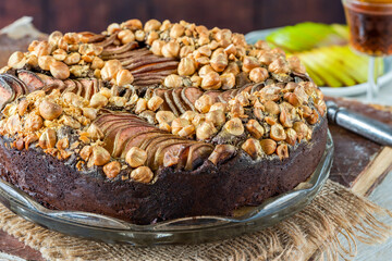 Moist chocolate, pear and golden hazelnut torte