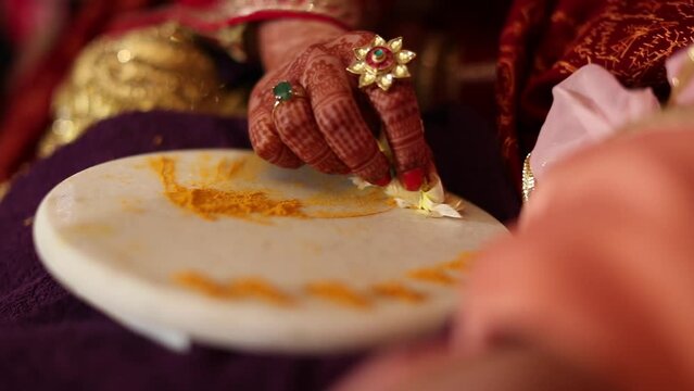 A shot of an Indian Wedding, where rituals are being performed in India