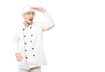 Astonished young chef with a gesture of looking away