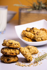 oatmeal cookies on a colored background,milk