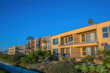 Seaside houses against clear blue sky background at Del Mar California.