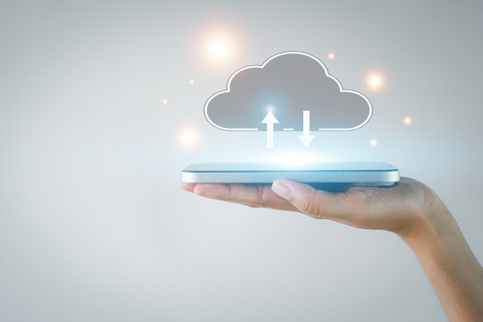 Cloud computing,Cloud technology,Computer,Cloud storage,Data Storage,business network concept., Smartphone on hand showing file transfer to cloud system virtual interface.,copyspace.