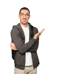 Puzzled student doing a gesture of not understand