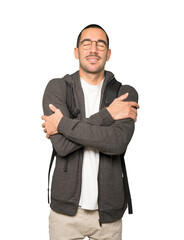 Happy student doing a hug gesture