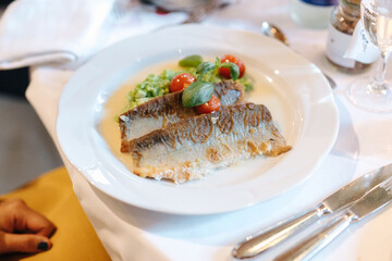 Delicious dinner beautifully arranged on a dinner plate.
