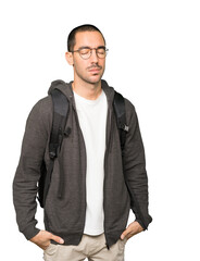 Fototapeta premium Tired student doing a gesture of boredom