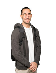 Happy student posing against background