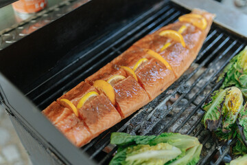 Grilled salmon at a barbecue