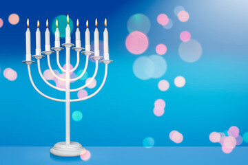 Jewish Hanukkah Menorah 9 Branch Candlestick. Holiday Candle Holder. Nine-arm candlestick. Traditional Hebrew Festival of Lights candelabra. Background for design with copy space