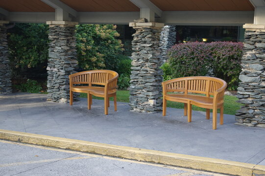 Wood Benches Between Stacked Stone Columns