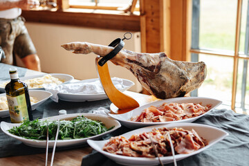 Iberian ham. Meat of a pig's leg. Spanish ham at a buffet