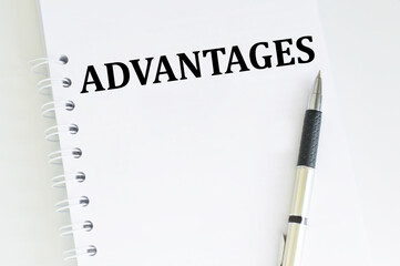 ADVANTAGES text on white page blonde on a light background, business and finance