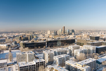 Beautiful Vilnius city panorama in winter with snow covered houses, churches and streets. Aerial...