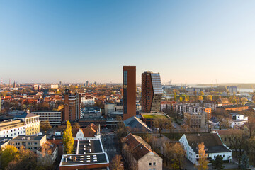 Fototapeta premium Scenic aerial view of the Old town of Klaipeda, Lithuania in golden evening light. Klaipeda city port area and it's surroundings on autumn day.