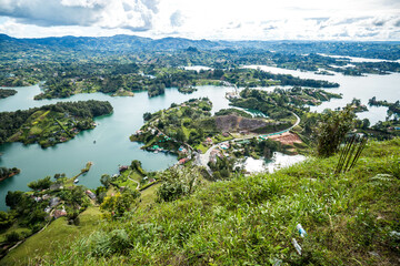 Fototapeta na wymiar Guatapé incredible breathtaking view on a beautiful nature of northwest Colombia, just a short travel for tourist from Medellín. View from famous Peñón de Guatapé in Antioquia Colombia. Medellín