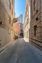 Fototapeta na wymiar View from the back alley of residential buildings in San Antonio Texas