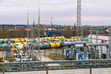 Electrical substation. Railway tanks..An electrical installation designed for receiving, converting and distributing electrical energy. An electrical transformer for converting electrical energy.