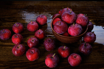 Clay plate with red apples. Red ripe apples.