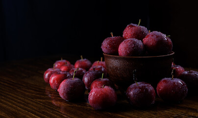 Clay plate with red apples. Red ripe apples.