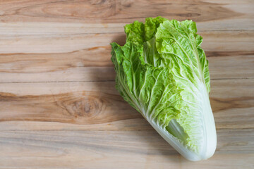 fresh chinese cabbage on wooden table background