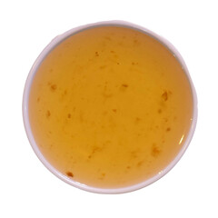 Plum sauce on white plate. isolated on white background.
