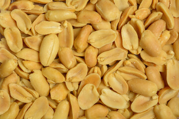 Salted Peanuts on natural light. Top view close up.