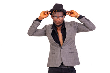 young businessman wearing a black hat.