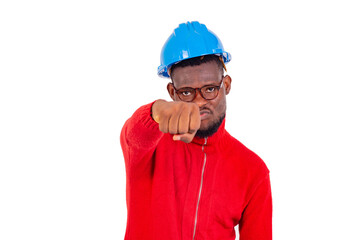 young man engineer showing his fist.
