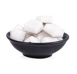 The coconut meat is cut into squares in a black cup isolated on transparent background (.PNG)