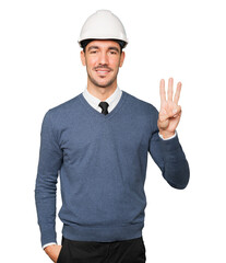 Young architect making a gesture of number three