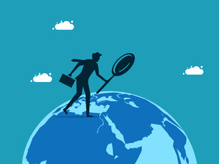 Businessman exploring the world with a magnifying glass. business concept vector illustration eps