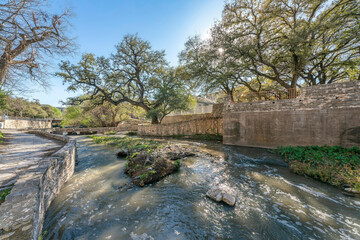 Fototapeta na wymiar Austin Texas scenic landscape with water from the river flowing on canals