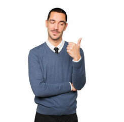 Hesitant young man gesturing that everything is fine