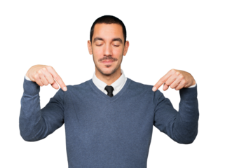 Surprised young man pointing down