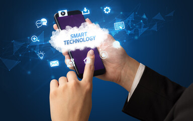 Obraz premium Hand using smartphone with cloud technology concept