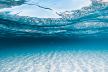Transparent blue sea with sandy bottom underwater in Australia