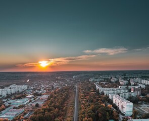 Autumn city, Ukrainian city against the backdrop of sunset, view from a drone, aerial photography
